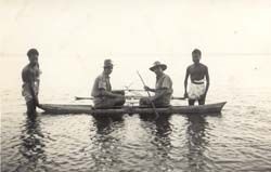 John Cameron (right) with Corporal and Tolai Natives in boat